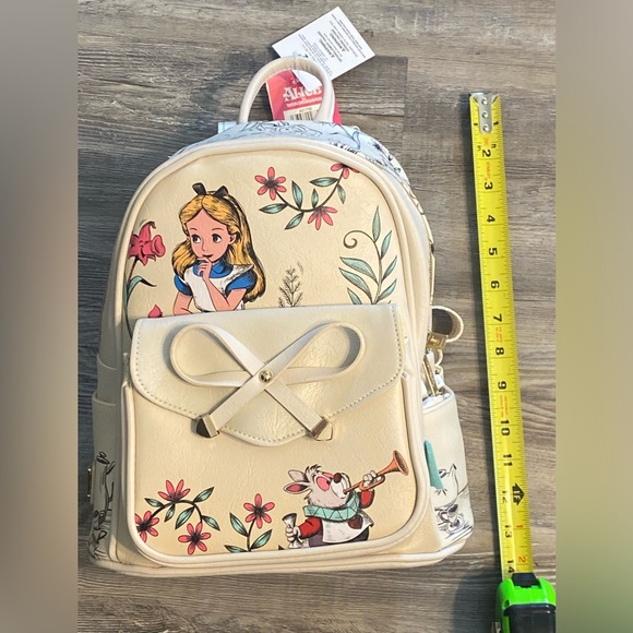 Disney Handbags - NWT DISNEY Alice In Wonderland Backpack Bag